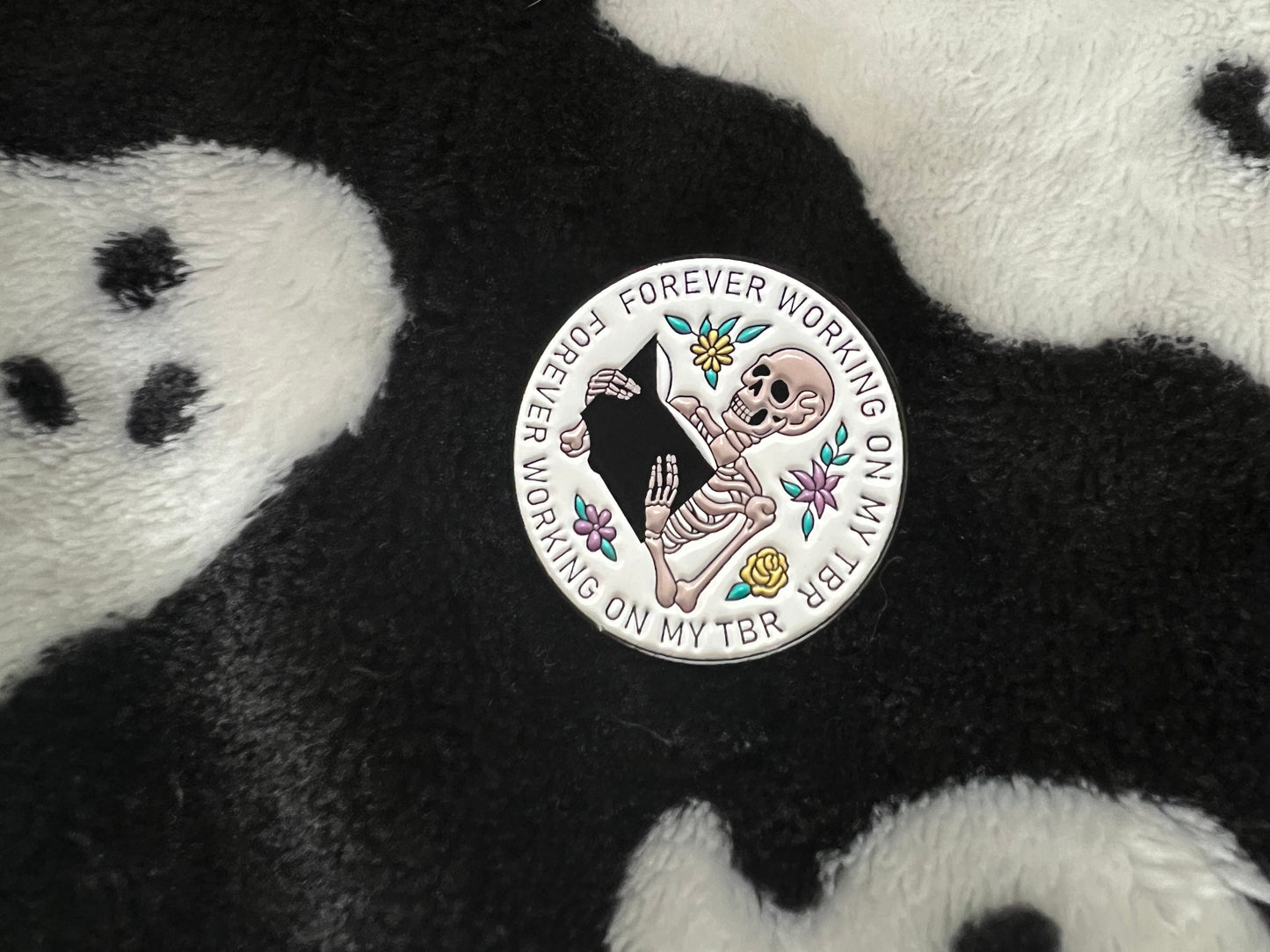 Working on my TBR enamel pin