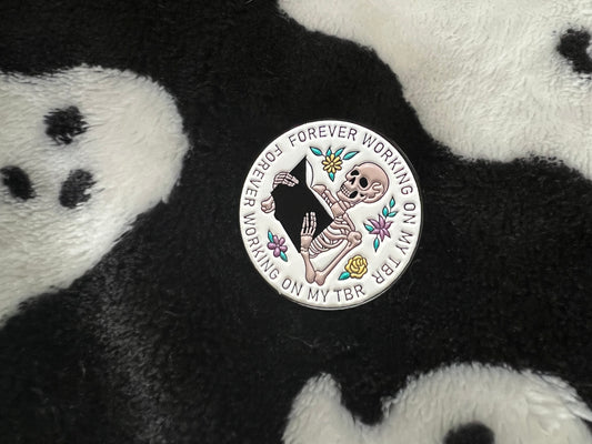 Working on my TBR enamel pin