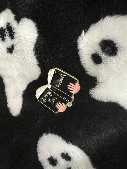 Booked up enamel pin